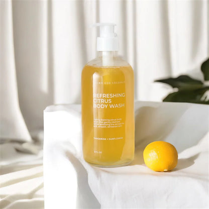 Brown and Coconut Refreshing Citrus Body Wash Next to Citrus