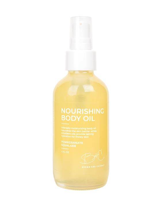 Brown and Coconut Nourishing Body Oil on white background